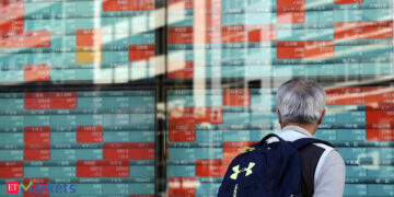 Asian shares: Asian shares put up modest positive factors, greenback edges down