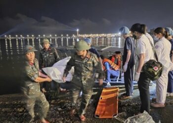 Vacationer boat capsizes throughout a thunderstorm in Vietnam, 34 useless : NPR