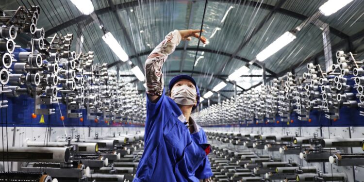China manufacturing unit exercise edges up in November however stays in contraction