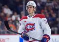 Canadiens’ Jake Evans exits after hit from Capitals’ Tom Wilson