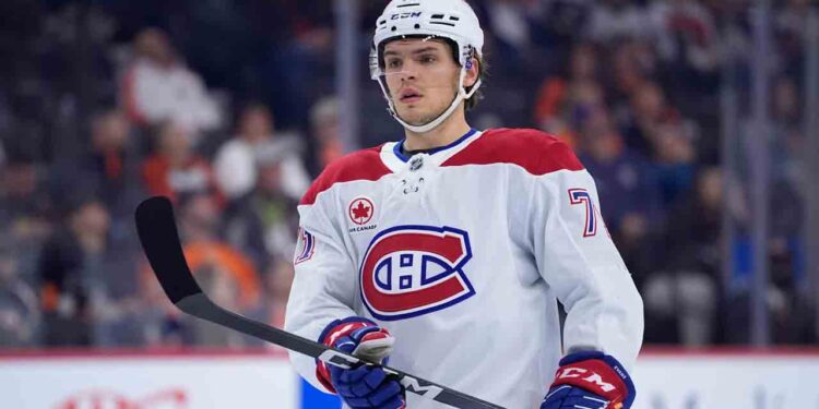 Canadiens’ Jake Evans exits after hit from Capitals’ Tom Wilson