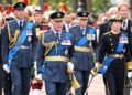 Members Of The Royal Household Gathered For The Queen’s Coffin Procession In London