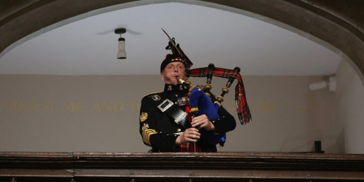 Queen’s Piper Performs Bagpipes At Funeral