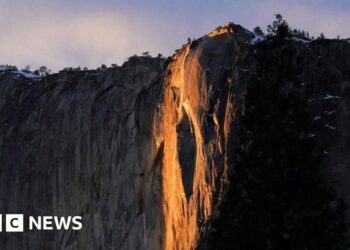 Yosemite waterfall turns molten orange