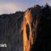 Yosemite waterfall turns molten orange