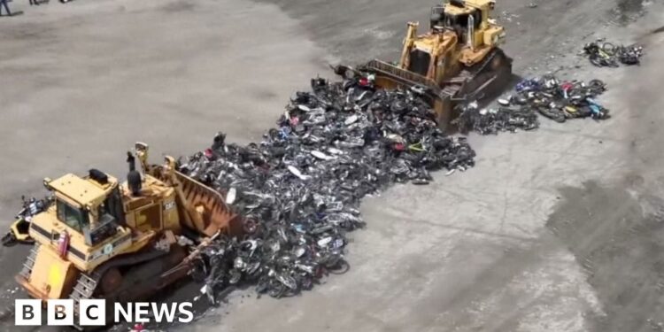 A whole lot of unlawful motorbikes bulldozed in NYC crime crackdown
