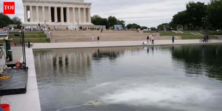 America@250 swathed in crimson, white, and blue — and inexperienced algae
