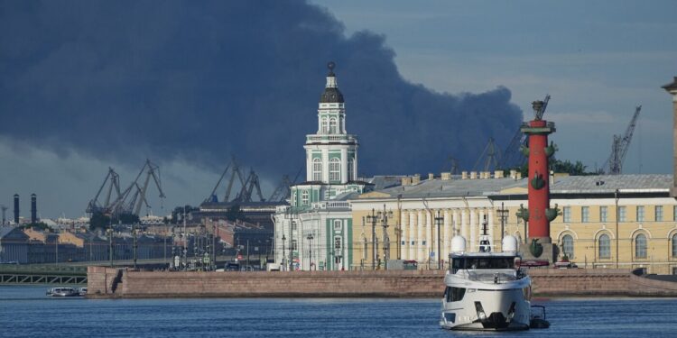 Ukrainian drones strike a St. Petersburg oil terminal forward of Putin go to : NPR