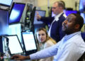 Nasdaq Slips as Chip Shares Come Below Strain