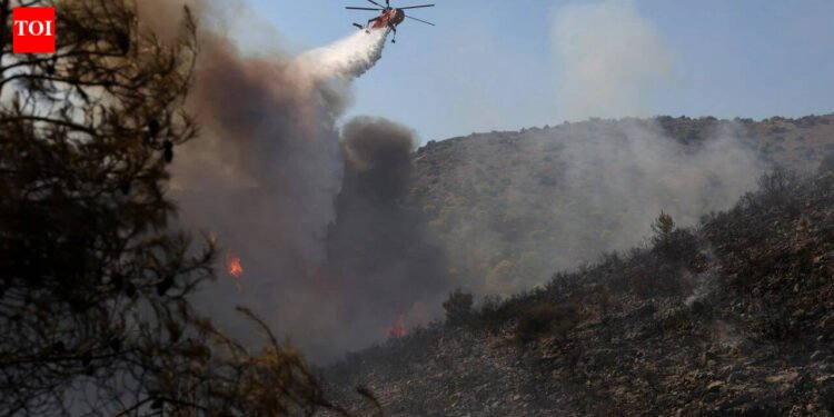 2 useless, 500 evacuated as twin blazes hit Greek island close to Athens