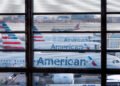 Laptop computer hearth sparks mid-air scare on American Airways flight; passengers injured