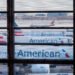 Laptop computer hearth sparks mid-air scare on American Airways flight; passengers injured