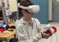Meet Scott Merrow, the 14-year-old New Hampshire gamer who constructed a 3D-printed adaptive VR controller after he discovered he couldn’t grip the usual left-hand controller