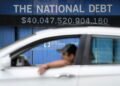 US debt; Venezuela offers; Noncitizen voting claims : NPR