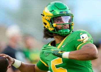 Oregon QB Dante Moore taken off on stretcher after low-cost shot