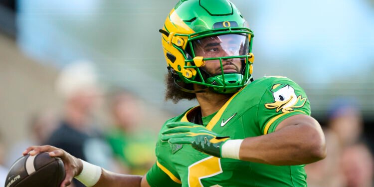 Oregon QB Dante Moore taken off on stretcher after low-cost shot