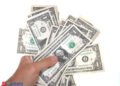 Greenback holds losses as markets await Fed minutes, audio system